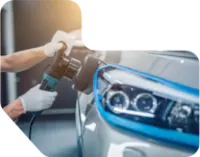 Polishing a vehicle in the Younik Auto Detailing Shop