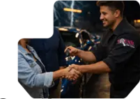 Happy customers getting keys back from Younik Auto Detailing Technician