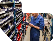 Younik Auto Detailing Shop Assistant selecting tint rolls