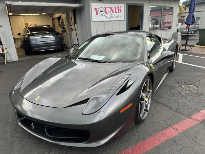 Younik Auto Detailing completed this Ceramic Coating of a silver ferrari shown here outside their shop after the service